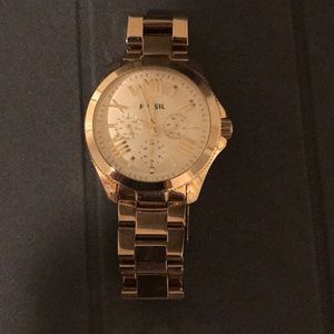 Gold fossil watch
